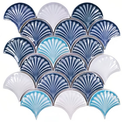 Fluted fan shaped porcelain mosaic tile in mixed ocean blue, light turquoise, and white colors for coastal bathroom walls and shower floors - Foctile