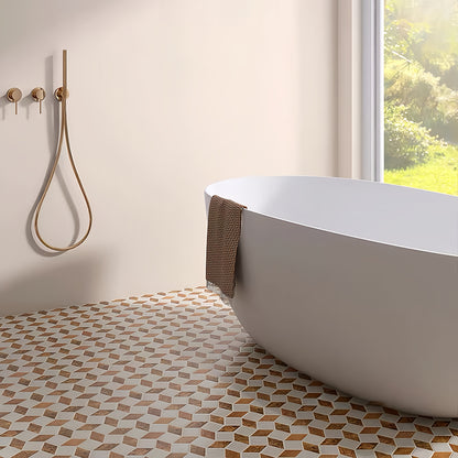 Zen-like and serene marble mosaic bathroom floor in neutral beige and brown, enhancing a luxury spa aesthetic. MST038 FOCTILE